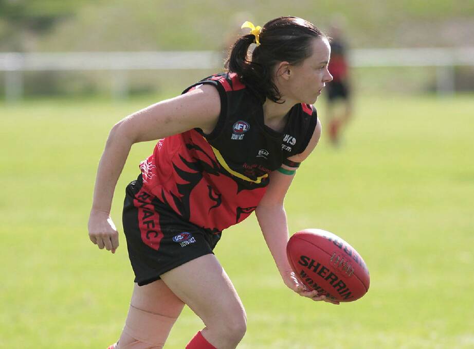 Julie McLean looks for a handball during a 2016 Riverina Lions game against Tuggeranong at McPherson Oval. Picture by Les Smith