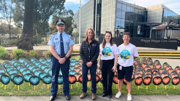 Ben Smith, Joanne Cheshire, Kia Leighton-Popple and Trish Suckling were raising awareness about road safety and incident prevention outside Wagga Civic Centre on May 8 for National Road Safety Week 2024. Picture by Emily Anderson
