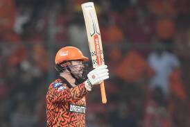 Travis Head does it again - a 16-ball half-century in an IPL triumph, reached with a huge six. (AP PHOTO)