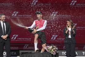 Benjamin Thomas celebrates on the podium after winning the fifth stage of the Giro d'Italia. (AP PHOTO)