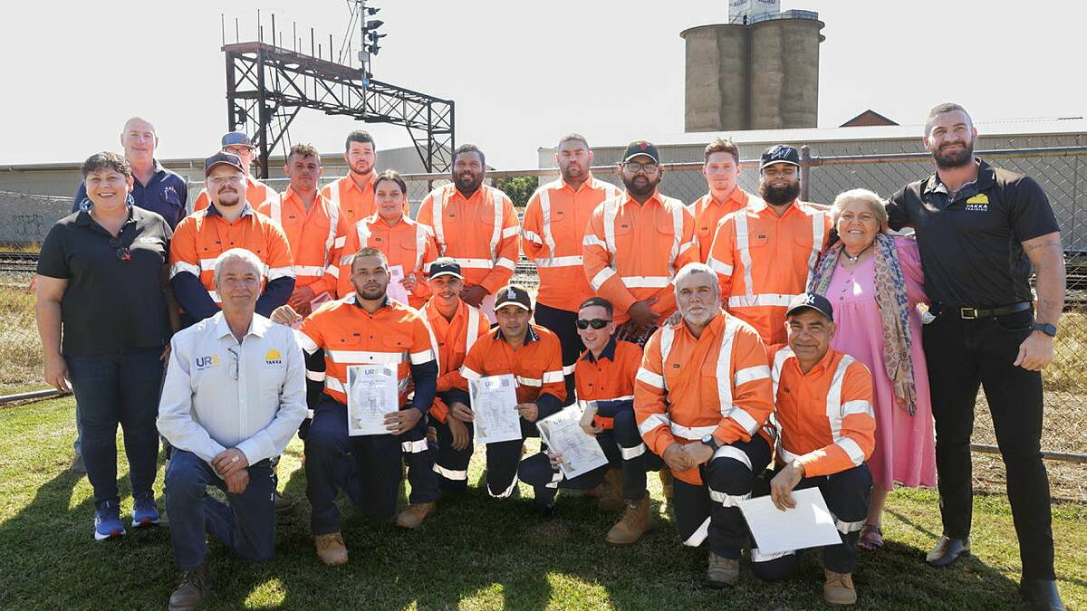  A cohort of Wagga workers celebrate as they graduated from a Certificate II in Rail Infrastructure course on Tuesday. Picture by Tom Dennis
