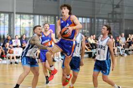 Wagga Heat's Angus Lourey attacks the rim during their 88-80 loss to Goulburn Bears on Saturday. Picture by Les Smith.