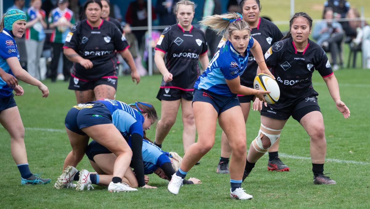 Milly Lucas passes the ball during Waratahs grand final win last year. Picture by Madeline Begley
