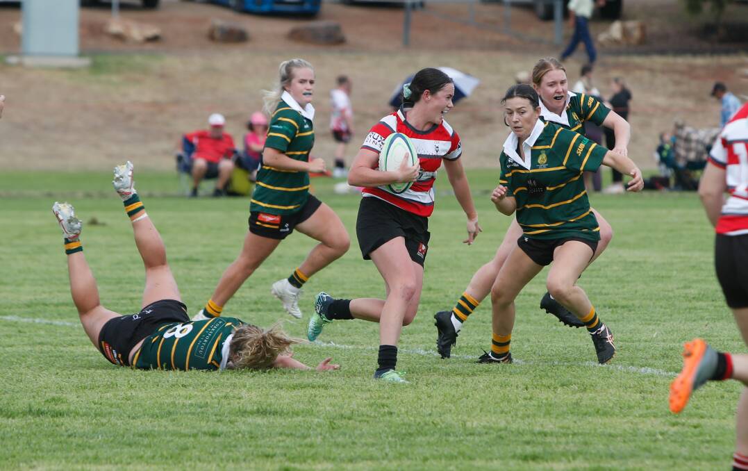 Reddies player Mikaela Feltham busts past the Ag College defence. Picture by Tom Dennis