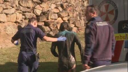 Police assist Elle Booth from Georges River. Picture via Nine News