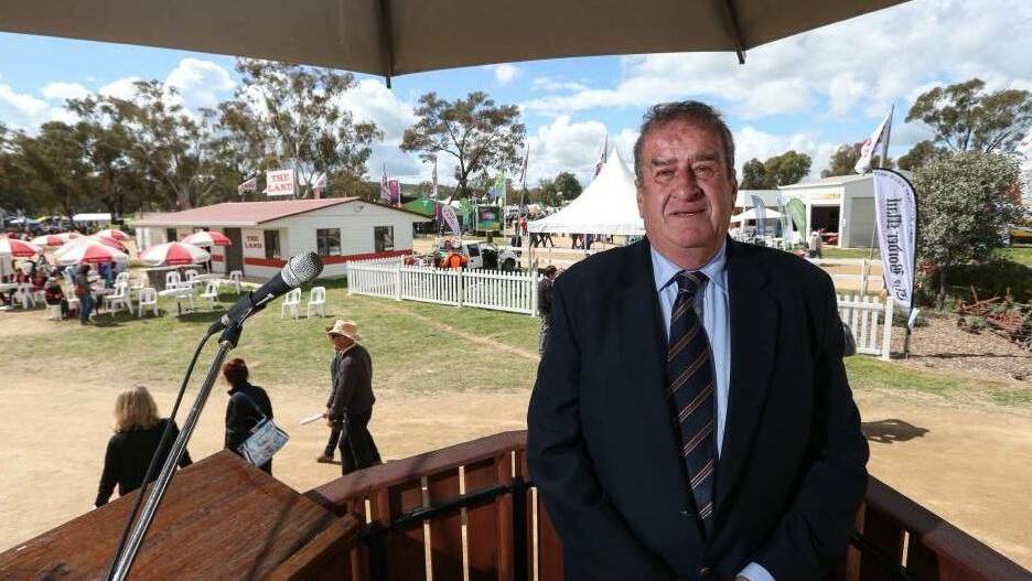 MATCHING IT WITH THE BEST: Henty Machinery Field Days chairman Ross Edwards at 'the stump' at Henty. 