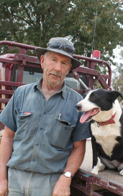 SAFETY CONSCIOUS: Junee farmer Tony Clough of "Windermere", pictured with his dog, Abbie, says mobile service is a safety issue. Picture: Nikki Reynolds