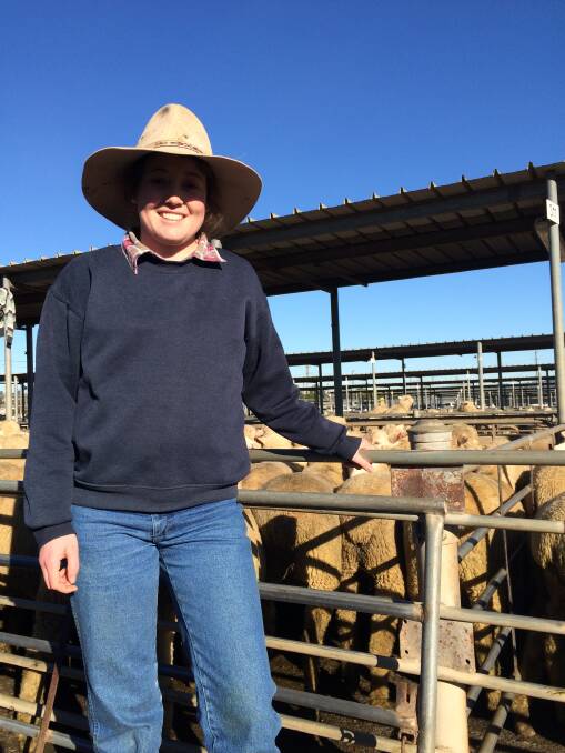 Vendor and lung transplant recipient Lauren Goldsworthy of "Courallie", Wantabadgery sells lambs for a high of $240 to raise funds for Lung Transplant Research. Picture: Nikki Reynolds 