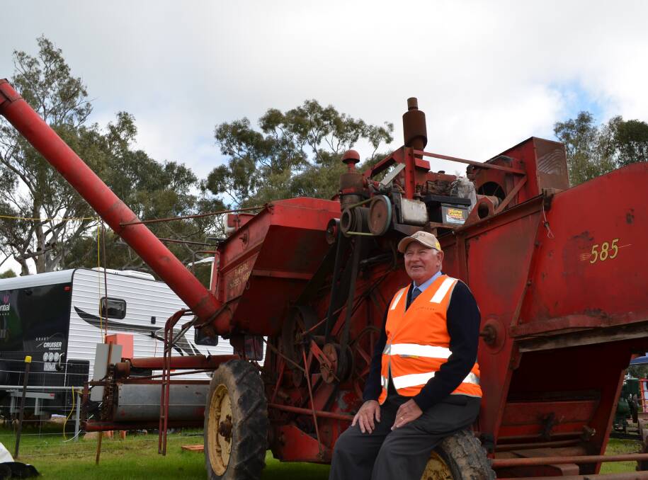 NEVER MISSED A BEAT: Field days stalwart Edward Dale of Henty is pictured with a Sunshine Massey Harris 1957 stripper. Picture: Nikki Reynolds 