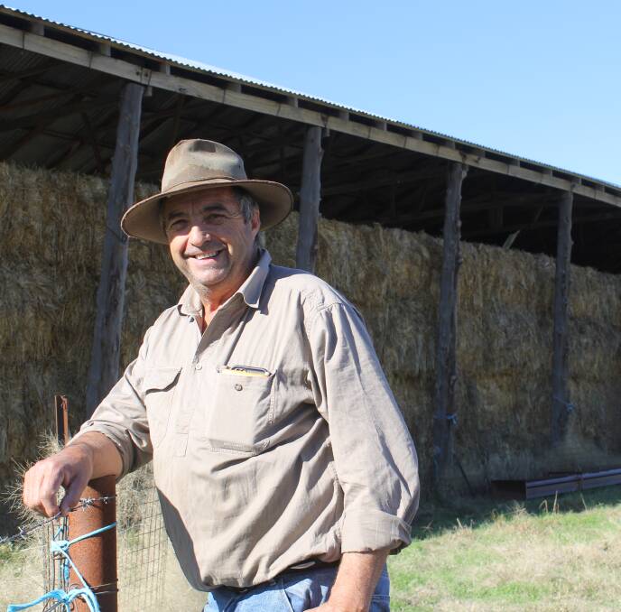 FODDER STOCKS: Bill Muller of "Nunlong", Bethungra is pictured near the hay shed on his southern NSW property. 