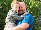 Wagga's Dan Berryman, pictured with son Charlie, says he is unable to get an appointment with a paediatrician in the public health system. Picture by Les Smith