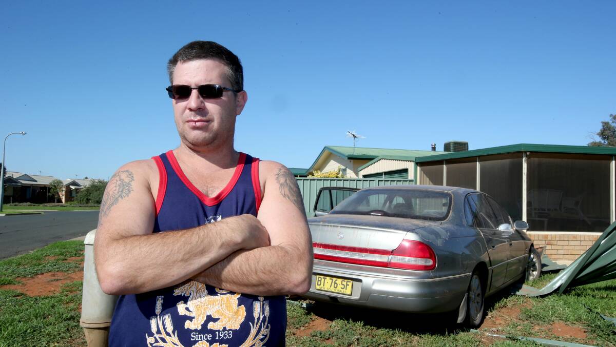 Stuart Shaw got a shock when he heard a loud noise as a car came crashing into his backyard in the early hours of Tuesday morning. Picture: Anthony Stipo