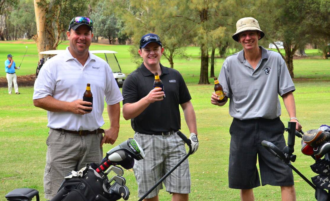 TEAM BONDING: RSM Bird Cameron Team hydrating during the 2015 golf day. Get your team in now for a great day out on the greens. 