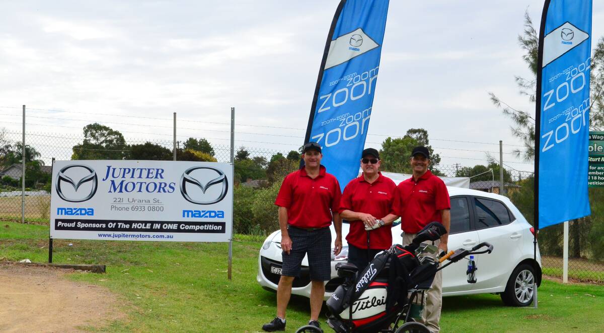 DRIVE AWAY: The Jupiter Motors Team are ready to have a shot at winning back their hole in one prize. Golfers have the chance to walk away with a new car. 