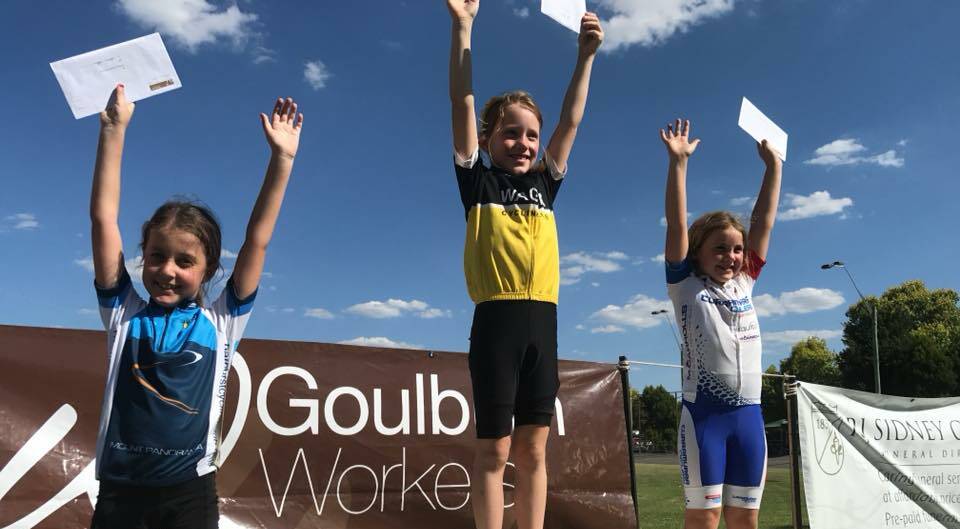 HAPPY DAYS: Carrington Oke celebrates her first-placed finish in the under 9 wheelrace at the Goulburn Trackpower Carnival on the weekend.