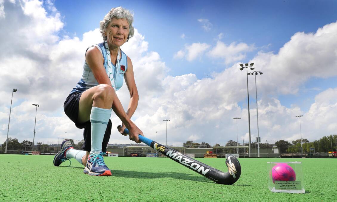 AS GOOD AS GOLD: Helen Lansdown takes a moment at Jubilee Park after winning gold at the Australian Masters Hockey Championships in Newcastle at the weekend. Picture: Les Smith