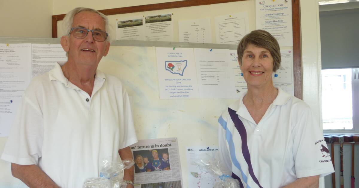 DEVASTATING DUO: Husband and wife combination Peter and Wendy Lloyd after triumphing in the doubles at he NSW Golf Croquet Handicap Championships at the Wagga Croquet Club on Thursday. Picture: Supplied. 