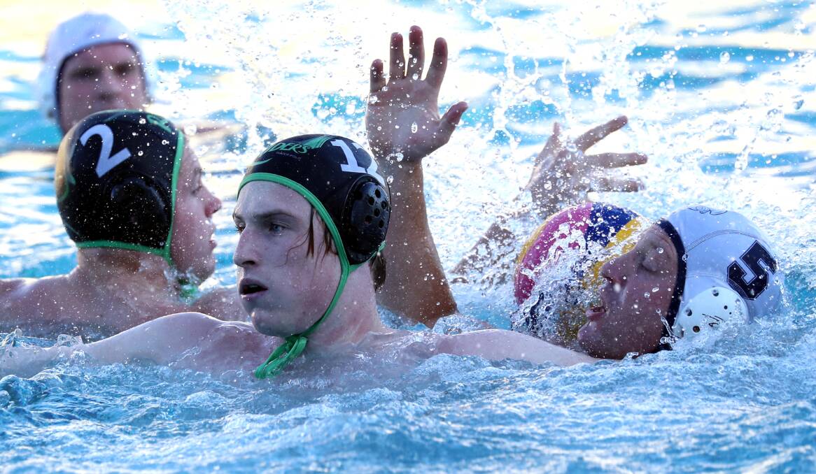 HEAT OF BATTLE: Raiders' Will De Jong, pictured earlier this season, looking fairly calm among the general chaos of A-grade water polo. Picture: Les Smith
