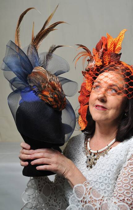 ALL BUSINESS: Professional milliner Karen Hyde hopes her colourful creations will take out first place at the Wagga Show this weekend. Picture: Kieren L. Tilly