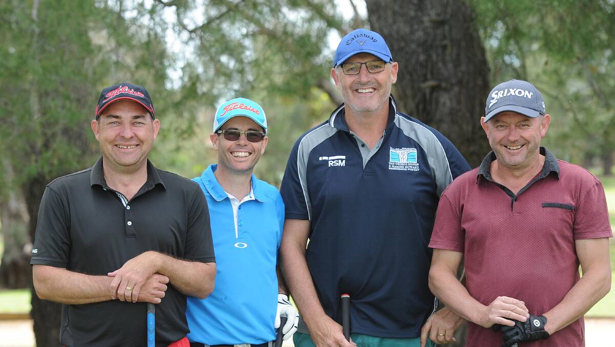 DAY ON THE GREEN: Mick Castles, Aaron Carruthers, Dean Cooper and Andrew Urh take a moment to smile for the cameras. 
