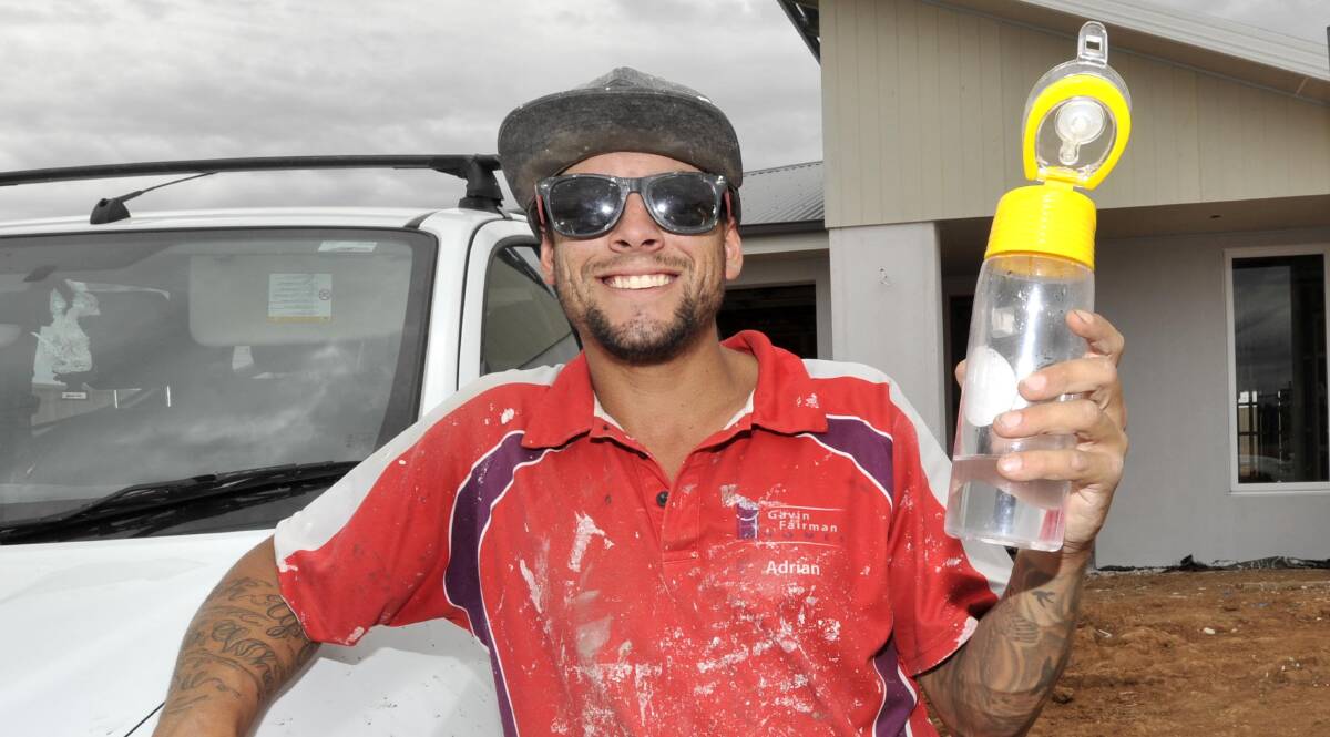 BEAT THE HEAT: Carpenter Adrian Gaeta says outdoor work can take a significant toll on those who are not well prepared for Wagga's sizzling summer months. Picture: Kieren L. Tilly