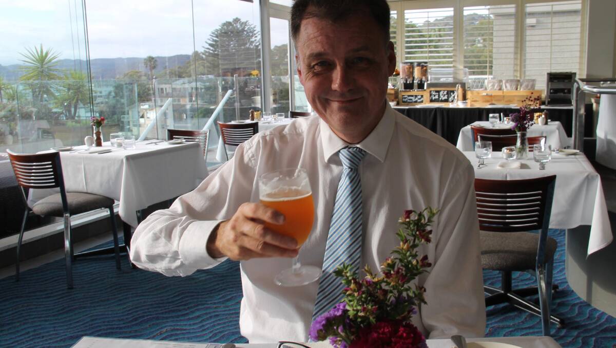 Here’s cheers … Stuart Crossman, general manager at Newport’s Metro Mirage Hotel.