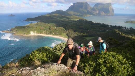 Lord Howe Island's Seven Peaks Walk: Malabar Hill overlooking Neds Beach with Lidgbird and Gower in the background. Photo: Supplied