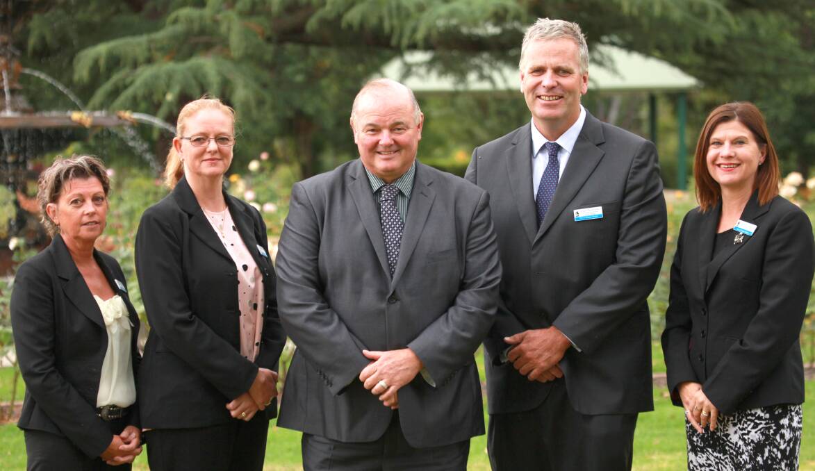 CHANGES: Wagga council's new sector managers Caroline Angel, Natalie Te Pohe, Paul Somerville and Janice Summerhayes with general manager Alan Eldridge (centre).
