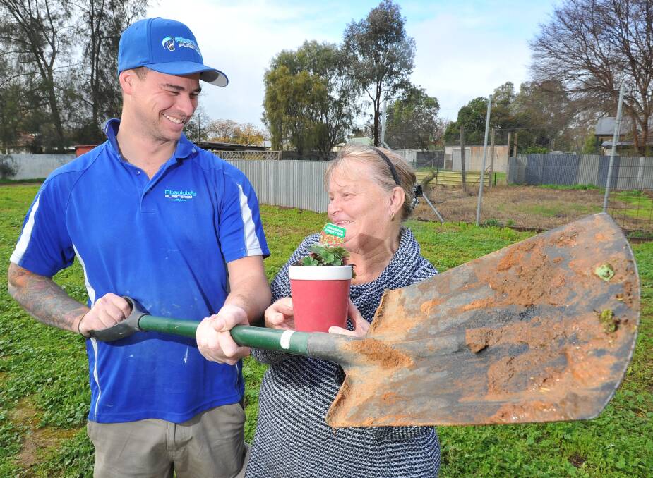 NEXT PROJECT: Wagga Community Blitz co-founder Lance Carr in the backyard of North Wagga resident Jill Ryan, which will be renovated soon. Picture: Kieren L Tilly 