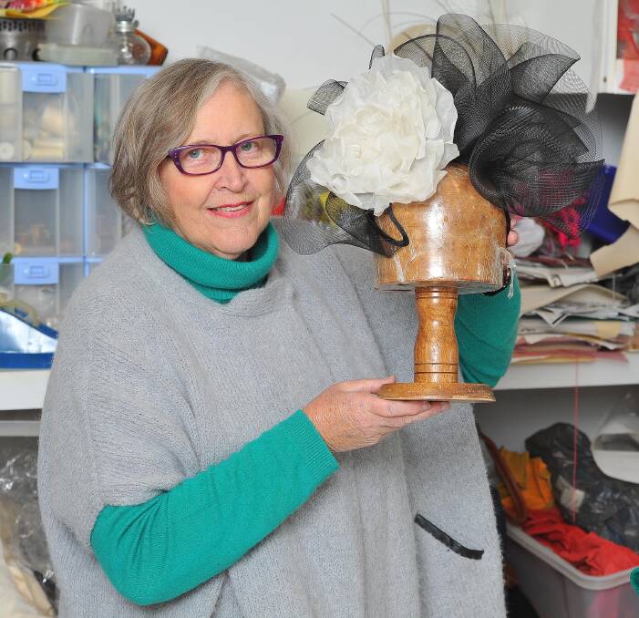 FINISHING TOUCHES: International Millinery Forum president Rose Maree Organ puts the finishes touches on preparations for the forum, starting in Wagga this Sunday. Picture: Kieren L Tilly