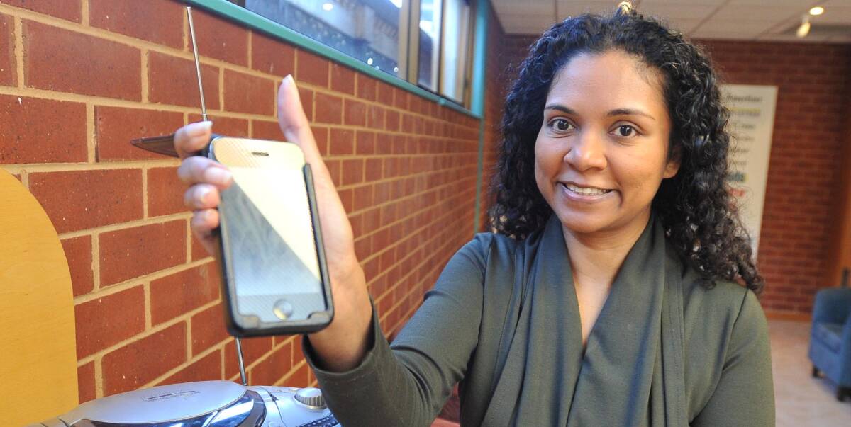 TECHNOLOGICAL AIDS: Wagga resident Thara Pech was diagnosed with retinitis pigmentosa when she was 13 and has been declared legally blind. Picture: Laura Hardwick