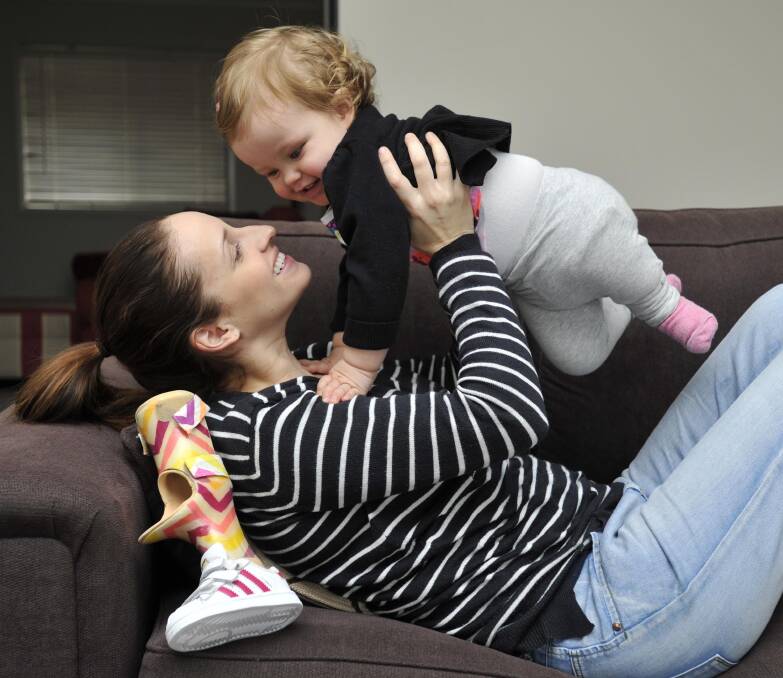 Leila Bright with daughter Mia Stewart, 14 months, at their Wagga home. Picture: Les Smith