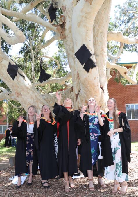 Chloe Bish, Tracey Lloyd, Ashton Yates, Jemima Hart and Mikaela Tyack, all graduated from the Diploma of Midwifery. Picture: Les Smith