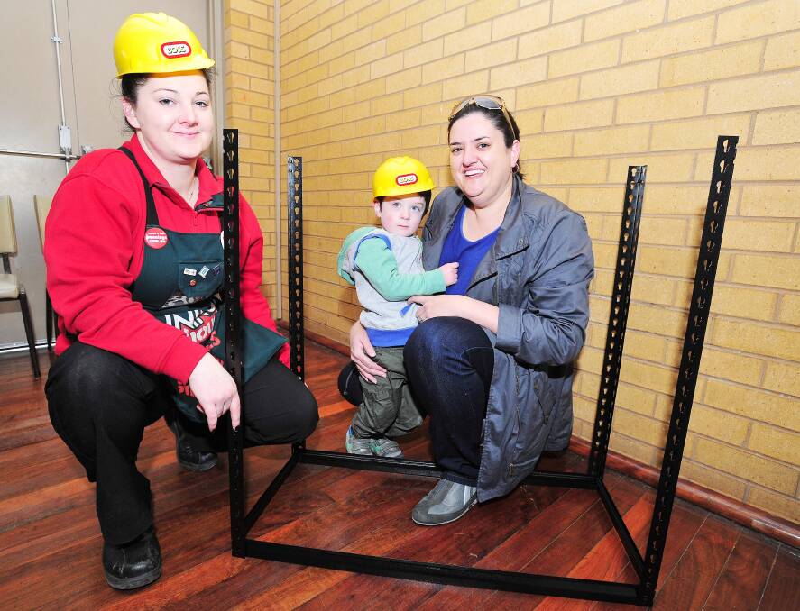 HELPING HANDS: Bunnings Wagga activities organiser AJ South, Alex O'Keefe, 3, and Glenfield Gigglers Playgroup committee secretary Claire O'Keefe. Picture: Kieren L Tilly 