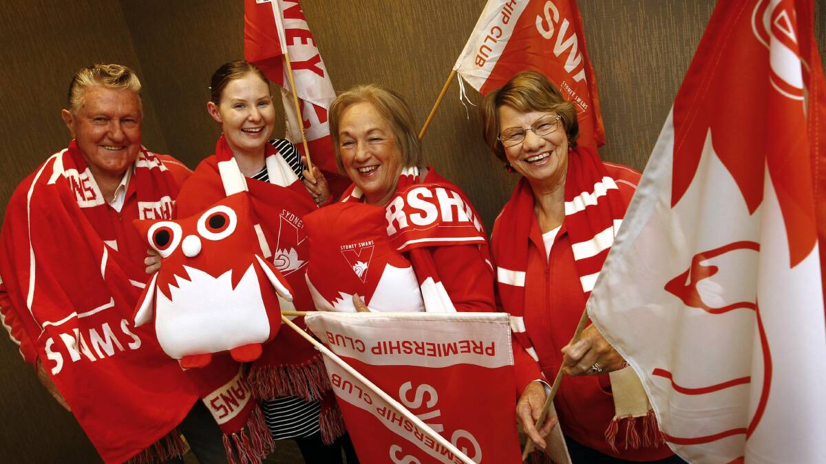 RED AND WHITE ARMY: Sydney Swans fan club members Ray Pellow, Linda Hoey, Coral Harris and Bev Pellow. Picture: Les Smith