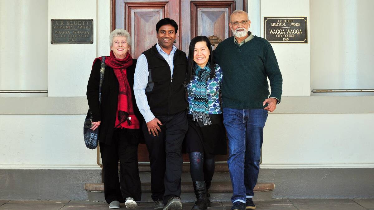 SHOULDER-TO-SHOULDER: Joan Saboisky from the Catholic Diocese, Anjanee Kumar Bichani from Hindu faith, Peir Woon Potowa from the Buddhist group and Dr Ata-ur Rehman from the Muslim Association. Picture: Kieren L Tilly