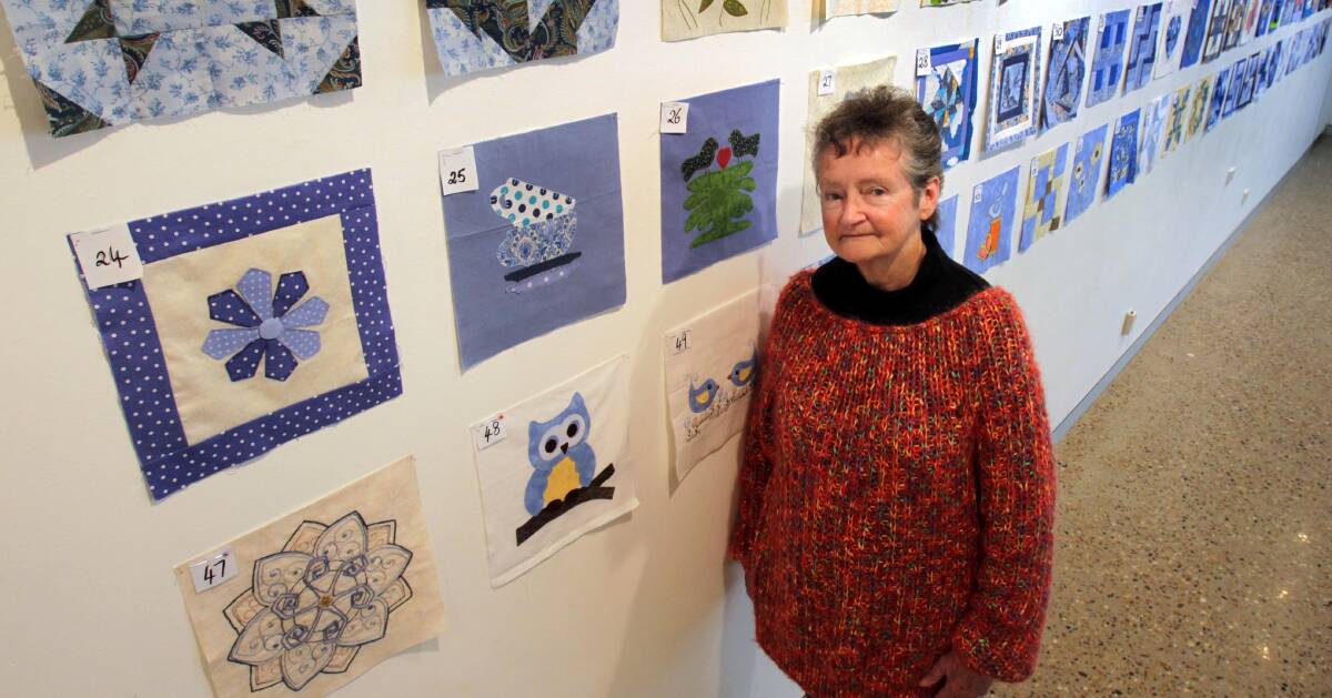 BLUE FOR MND: Margaret Flagg with the Patches of Blue for MND exhibition, which opens in Wagga this week. Picture: Les Smith
