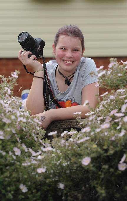 THE GIVING SEASON: Bonnie Sleaman, 13, is offering to take family photos for underprivileged families this Christmas. Picture: Laura Hardwick