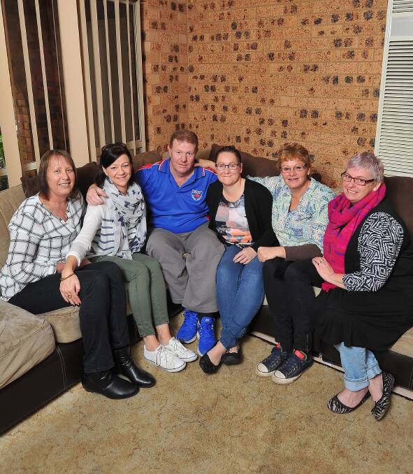 LOYAL FRIENDS: Melanoma patient Justin O'Reilly (centre) with Jen Burley, Anita Gentles, Natalie O'Reilly, Tania Jones and Ange Sandford. Picture: Kieren L Tilly