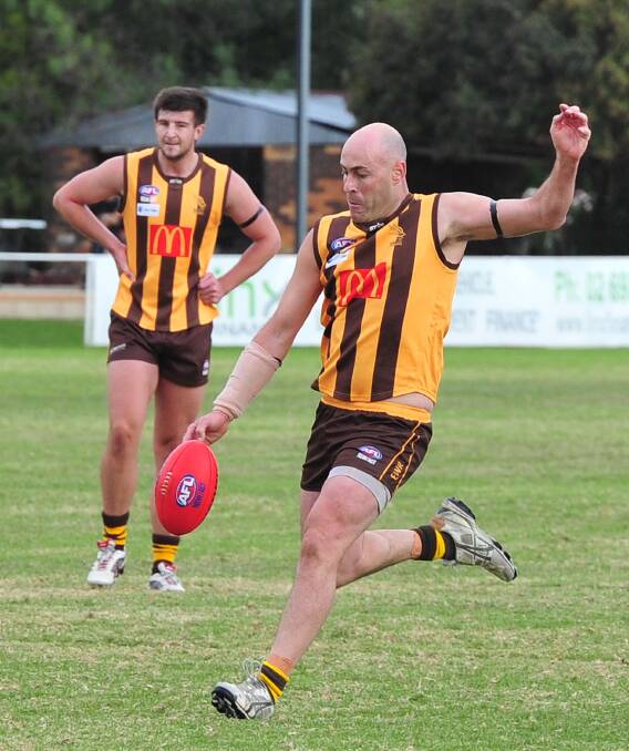 GOING FOR GOAL: East Wagga-Kooringal forward Chris Jackson unloads on goal in the game against North Wagga at Gumly Oval on Saturday. Picture: Kieren L Tilly