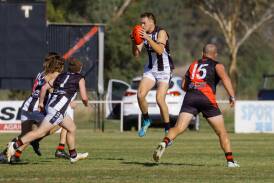 The Rock-Yerong Creek full-forward James Roberts grabs hold of the ball in the ANZAC Challenge against Marrar at Langtry Oval on Saturday. Picture by Bernard Humphreys