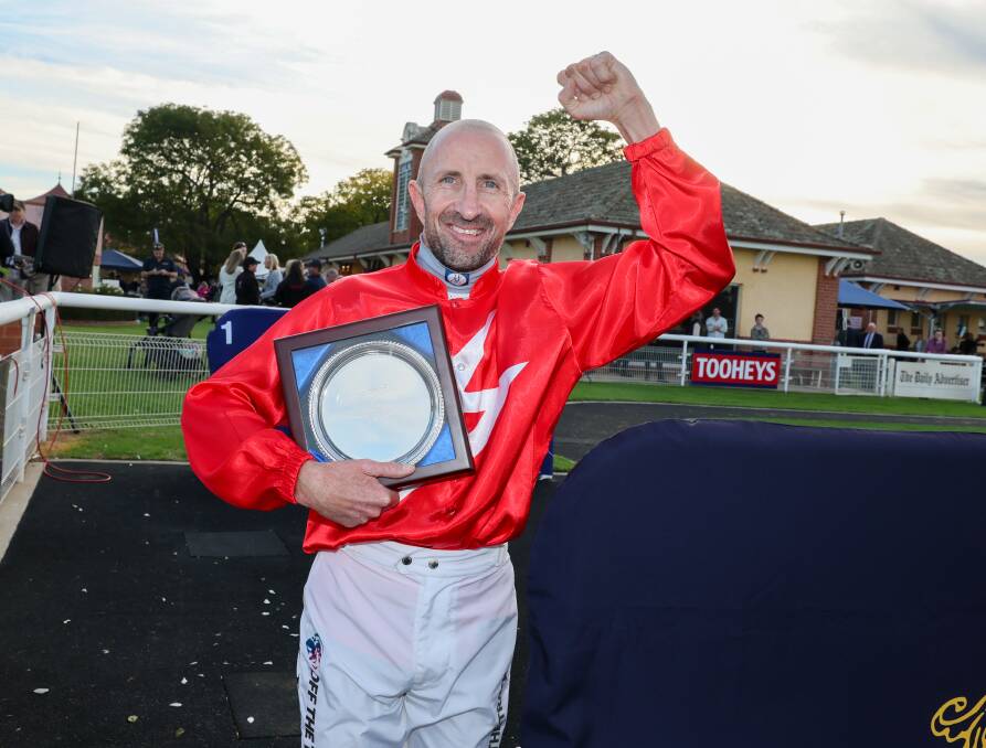Jason Lyon is all smiles after his win on The Prodigal Son in the Wagga Town Plate at Murrumbidgee Turf Club on Thursday. Picture by Les Smith