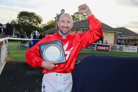 Jason Lyon is all smiles after his win on The Prodigal Son in the Wagga Town Plate at Murrumbidgee Turf Club on Thursday. Picture by Les Smith