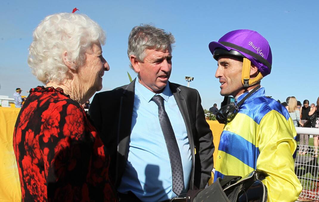 FAMILY AFFAIR: Kembla Grange trainer Paul Murray, his mother Edie and jockey Grant Buckley at last year's Gold Cup carnival. Picture: Les Smith