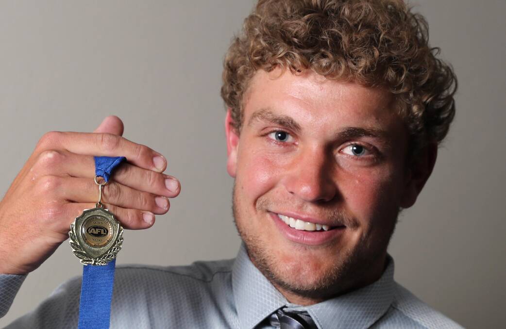 TOO GOOD AGAIN: Collingullie-Glenfield Park midfielder Jayden Klemke shows off his second Jim Quinn Medal on Tuesday night. Picture: Les Smith