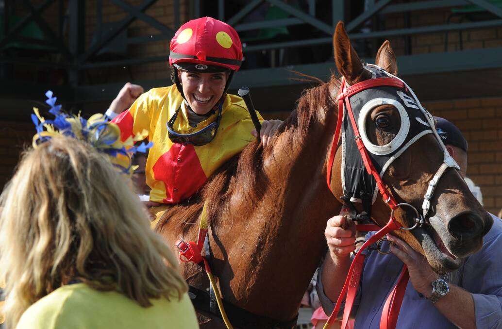 A WINNING SMILE: A happy Kayla Nisbet dismounts after guiding Mercurial Lad to a thrilling win in the $70,000 Snake Gully Cup (1400m) at Gundagai on Friday. Picture: Laura Hardwick