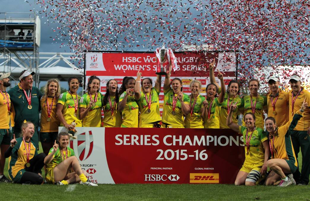 WE DID IT: The Australian Womens Rugby Sevens Side celebrate their world series victory in France. Picture: Neil Kennedy