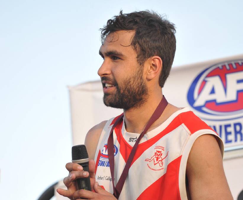 BRISBANE BOUND: Chris Jackson accepts the Ron Hutchins Medal after the Demons' premiership win at Narrandera in September. Picture: Laura Hardwick