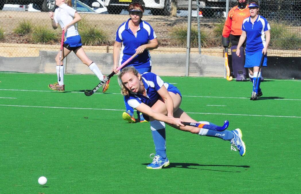 PASSING TRADE: Royals Blues' Sarah Bonny sends the ball into attack against Royals White at Jubilee Park on Saturday. Picture: Kieren L Tilly