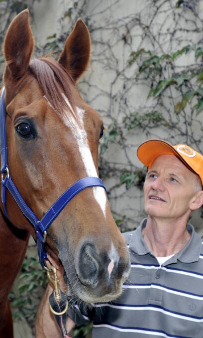 RETIRED: Wagga trainer Tim Donnelly with well-performed stayer Devised at his stables. Picture: Les Smith